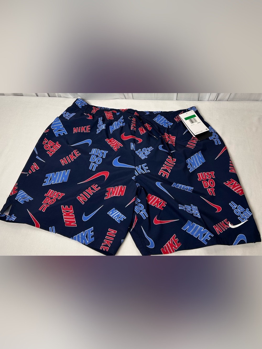 Nike Navy Swim Trunks with Red and Light Blue Logo Print